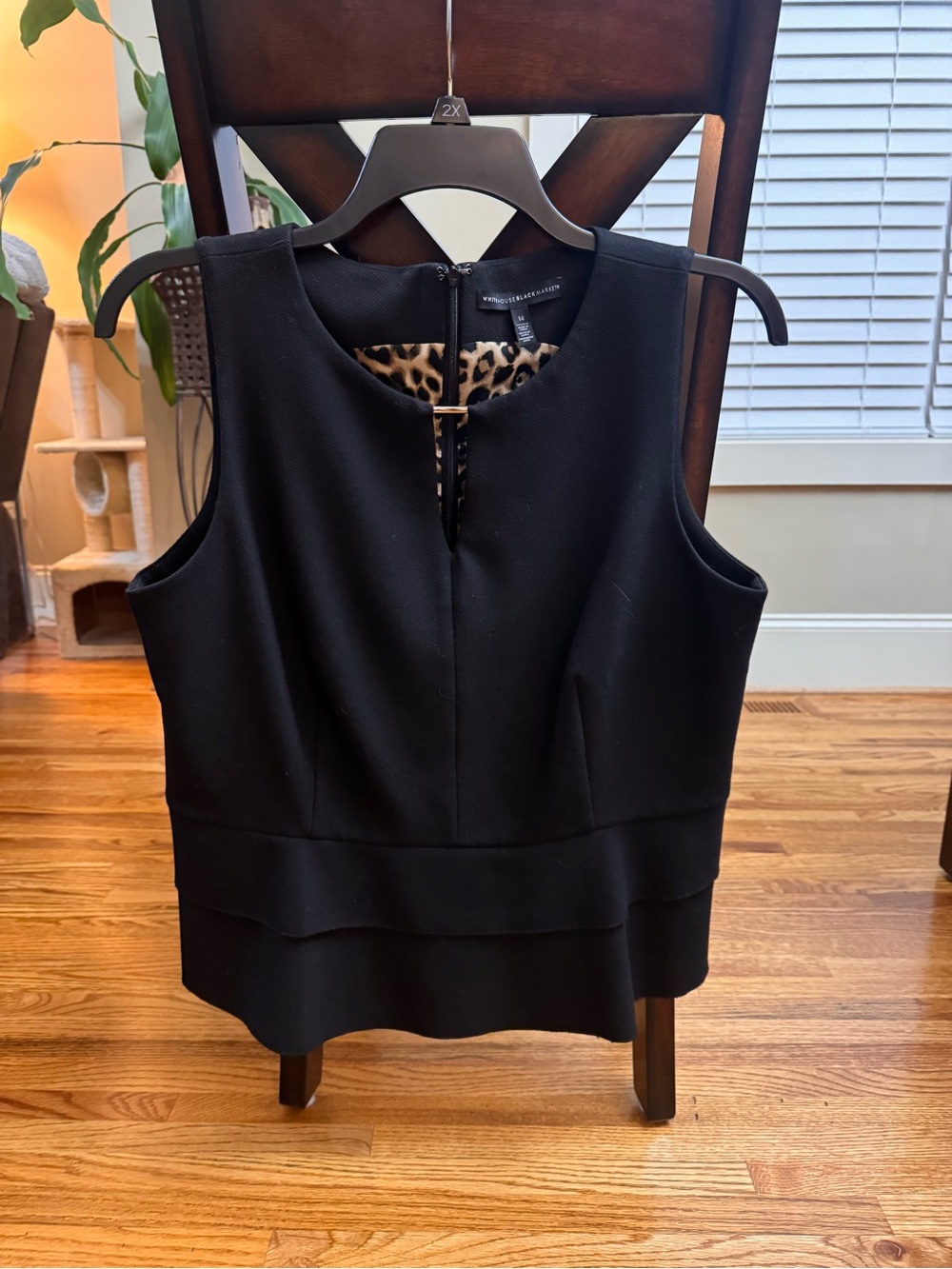 White House Black Market Black Sleeveless Peplum Top with Leopard Lining